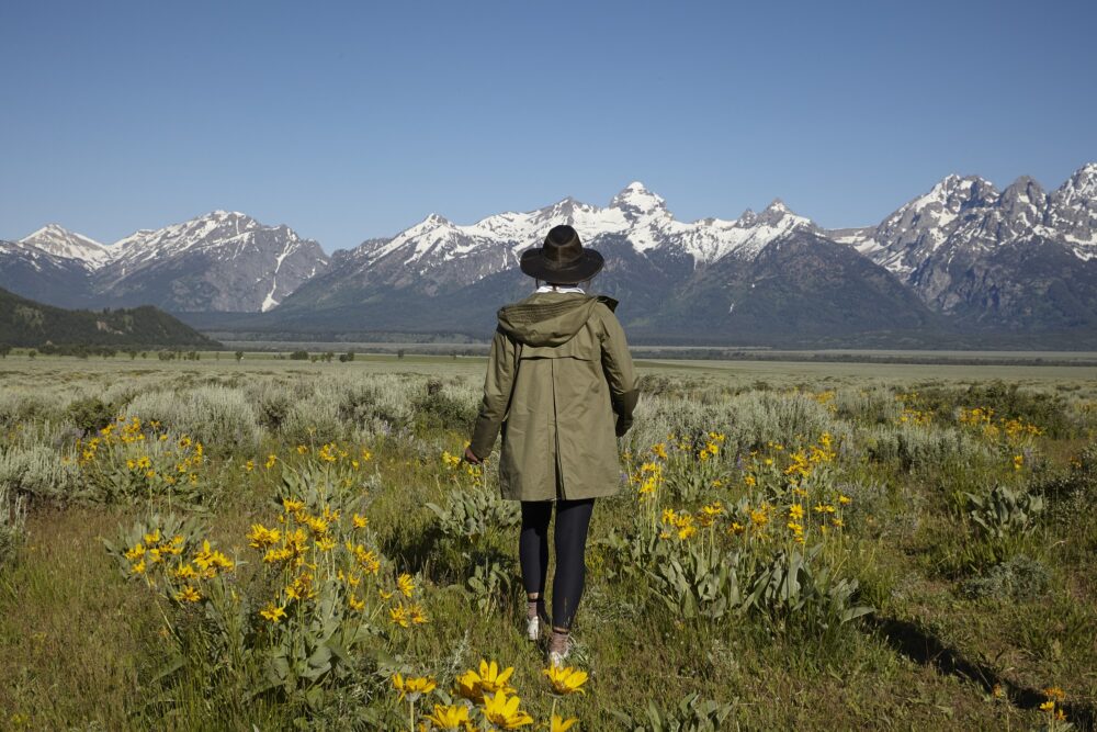 girl in a field of wild flowers