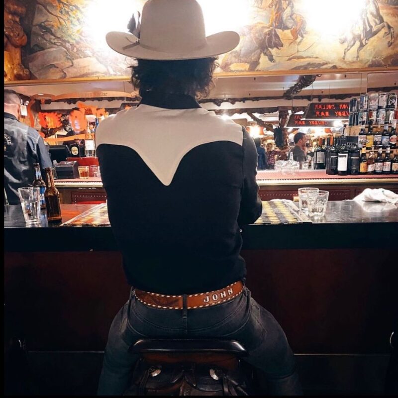 guy sitting on bar stool