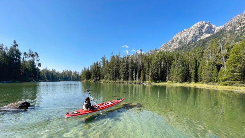 person kayaking in lake Jackson hole